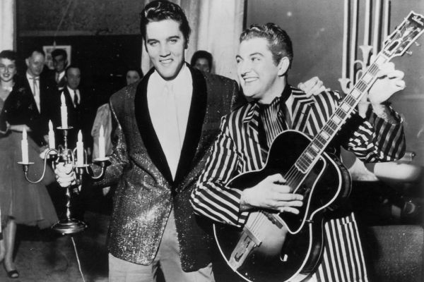 Elvis Presley and Liberace trading places in Las Vegas, 1956